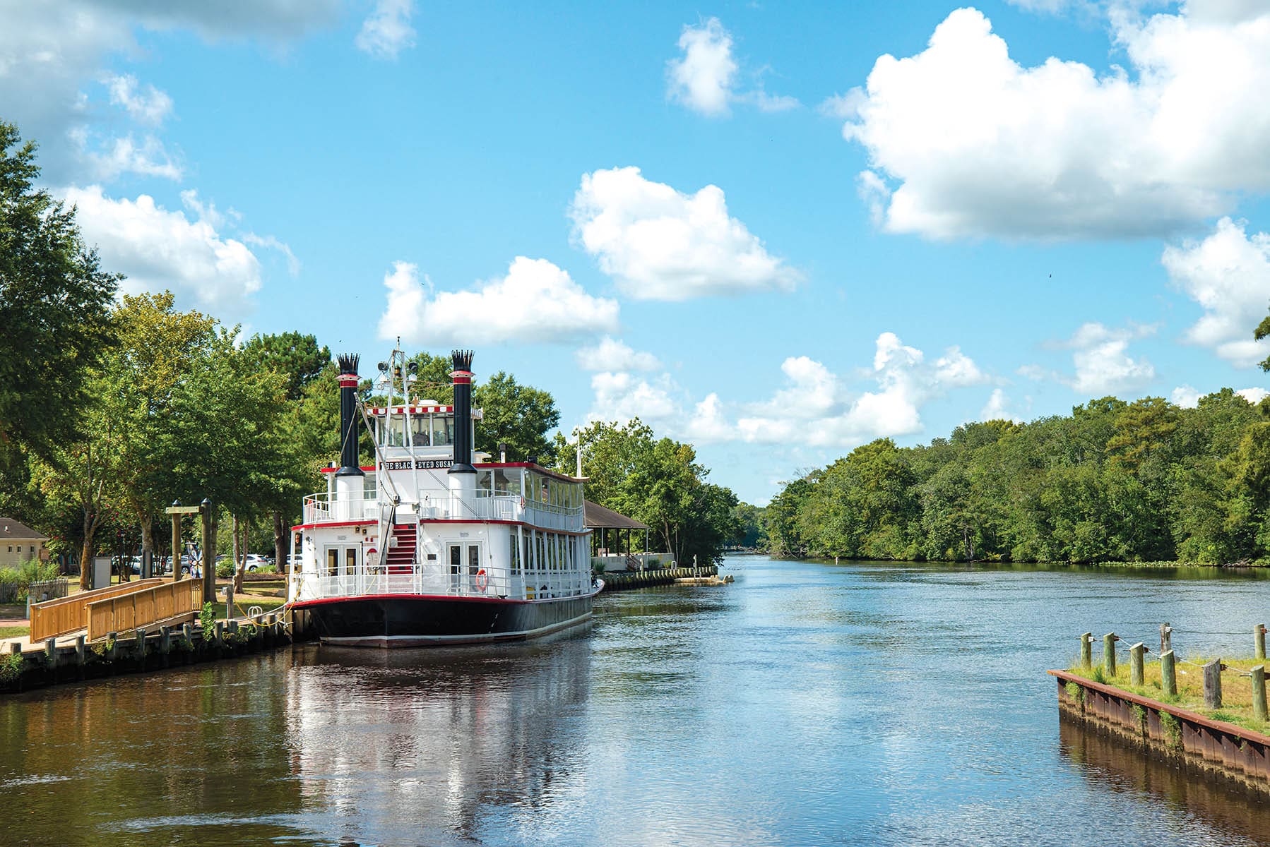 Riverboat docked along the scenic Pocomoke River in Snow Hill, Maryland
